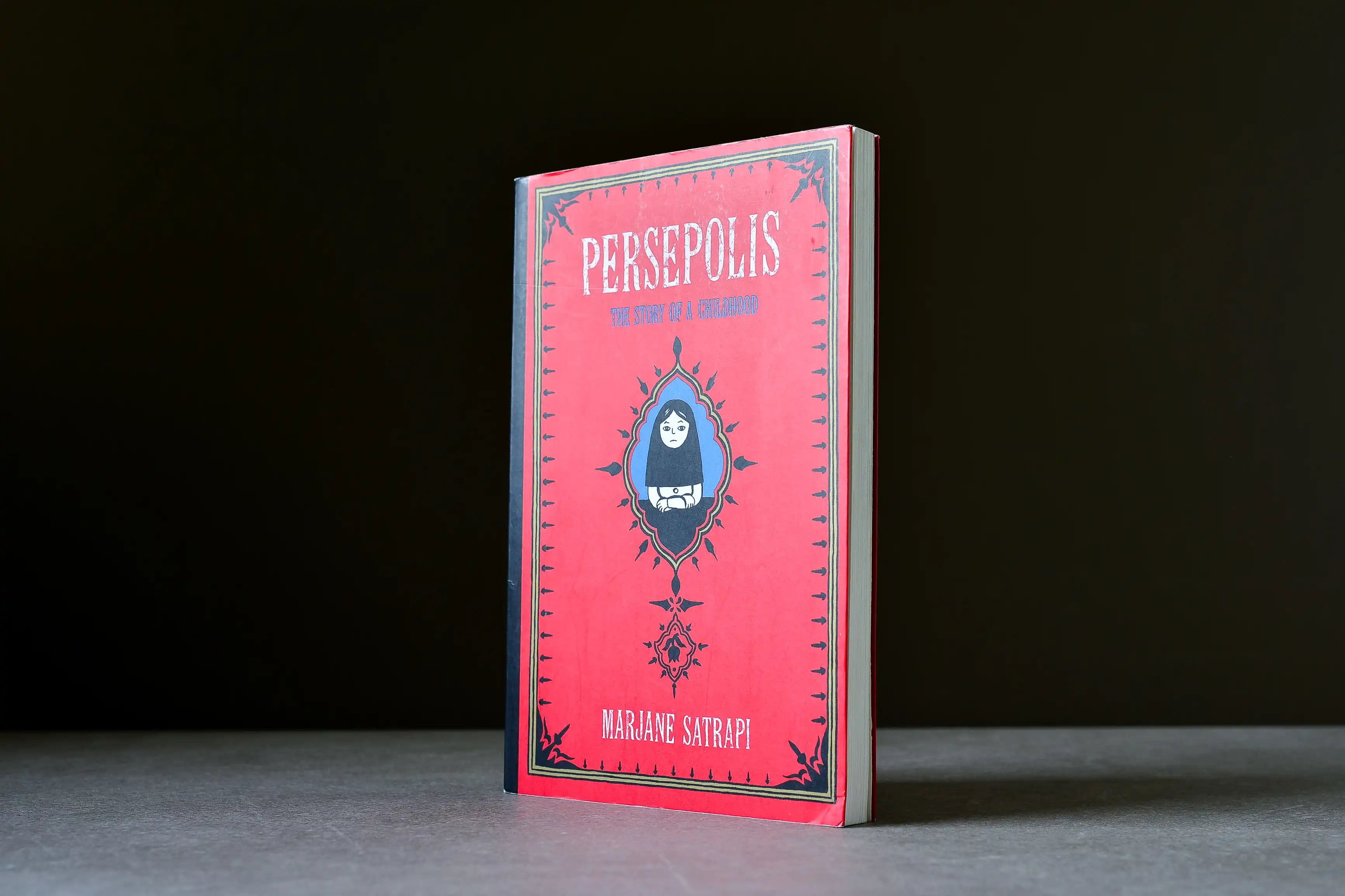 Satrapi, Marjane - Persepolis : The Story of a Childhood - Pantheon - 9780375714573 - Assez bon -  livre usagé